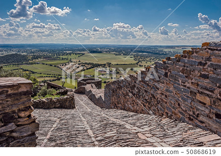Medieval paved wild stone road to the fortress Medieval paved wild stone road to the fortress 50868619