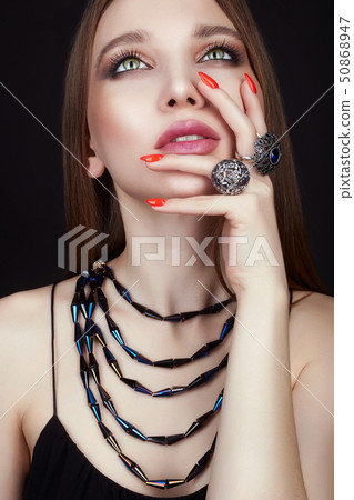 pretty young woman with jewelry rings pretty young woman with jewelry rings 50868947