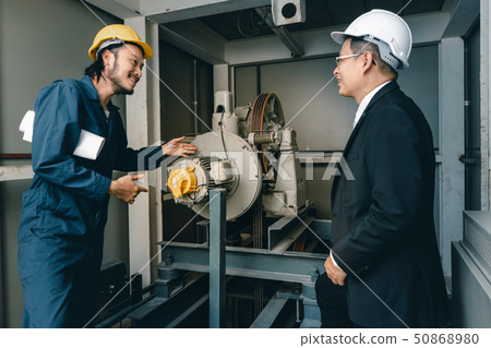 Asian engineers standing and smile to camera.. 50868980