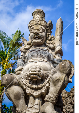 Gard statue on a temple entrance door, Ubud, Bali, 50870105