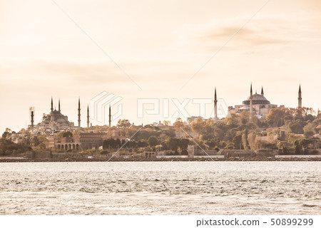 See the Blue Mosque and Hagia Sophia at dusk over the Bosphorus Strait See the Blue Mosque and Hagia Sophia at dusk over the Bosphorus Strait 50899299
