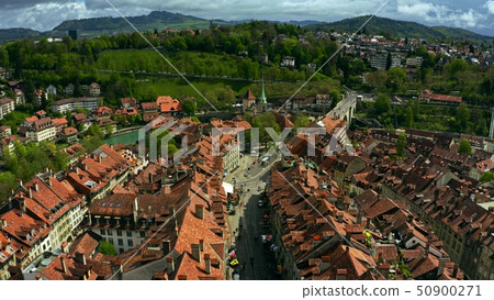 Low altitude flight over the Old City tiled houses of Bern. Switzerland 50900271