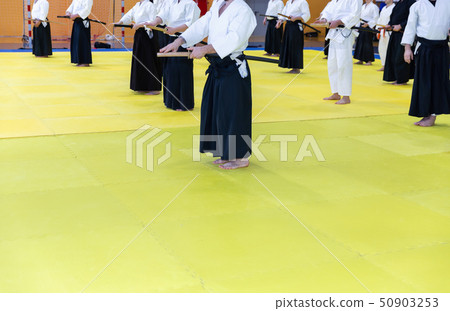 People in kimono on martial arts weapon training seminar People in kimono on martial arts weapon training seminar 50903253