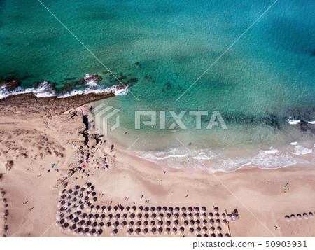 Wide sandy coastline, long sea waves of Falasarna beach Crete, Greece 50903931
