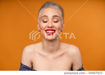 Portrait of young girl with blond short hairstyle Portrait of young girl with blond short hairstyle 50907937