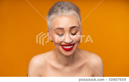 Portrait of young girl with blond short hairstyle Portrait of young girl with blond short hairstyle 50907939