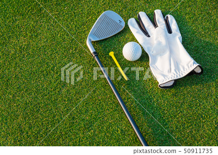 The golf sport white glove ,golf ball, yellow tee 50911735