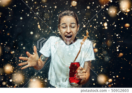 Woman drinking a cola 50912603