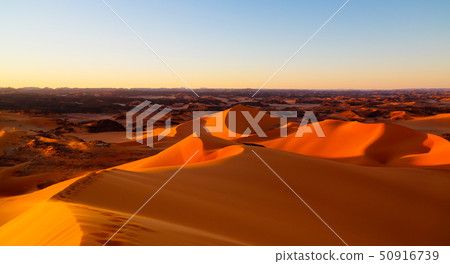 Sunset view to Tin Merzouga dune at Tassili nAjjer Sunset view to Tin Merzouga dune at Tassili nAjjer 50916739