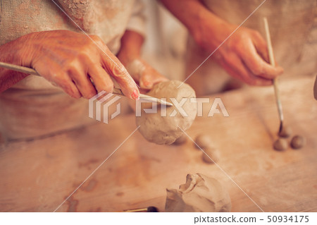Close up of a carving knife being in use 50934175