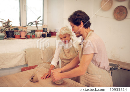Nice pleasant man and woman working together Nice pleasant man and woman working together 50935814