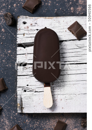 chocolate ice cream bar. 50940566