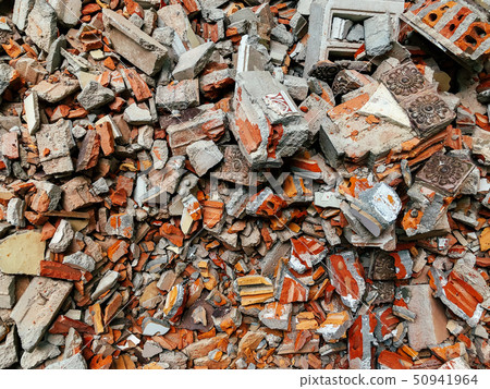 Pile of Broken red brick and concrete close up 50941964