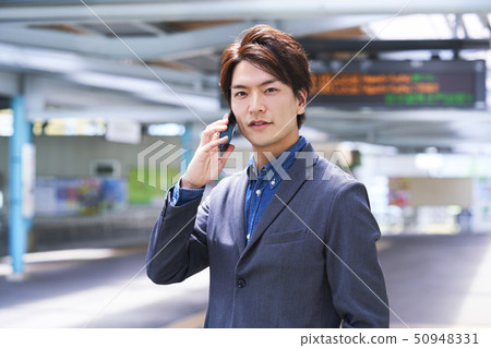 青年男子站主場射擊合作“京王電鐵有限公司” 50948331