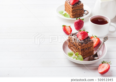 Truffle cake with chocolate and strawberries 50951945