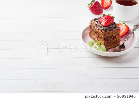 Truffle cake with chocolate and strawberries Truffle cake with chocolate and strawberries 50951946