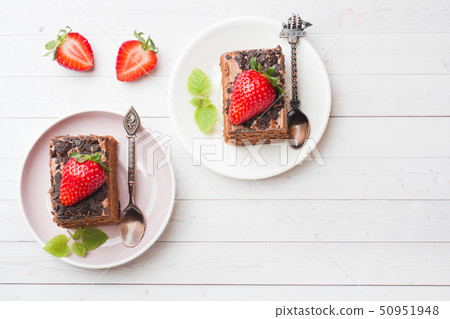 Truffle cake with chocolate and strawberries Truffle cake with chocolate and strawberries 50951948