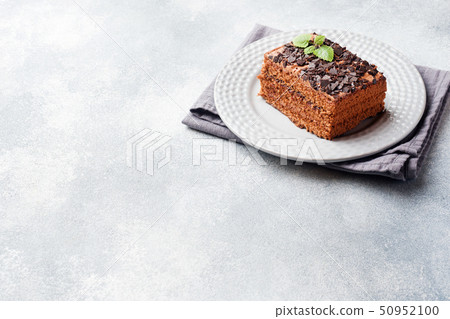 A piece of truffle cake with chocolate A piece of truffle cake with chocolate 50952100