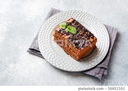 A piece of truffle cake with chocolate  50952101