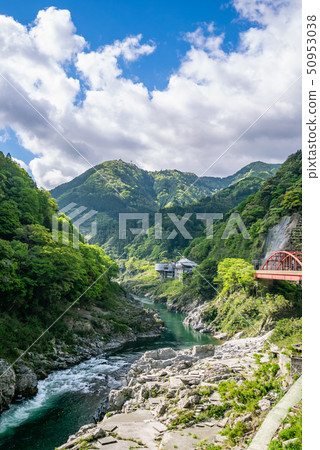 The railway bridge at Oboke Gorge and the clear waters of the Yoshino River gorge 50953038