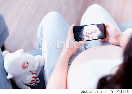 Asian pregnant woman with big belly.  50953188