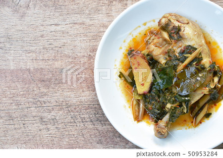 steamed spicy chicken thigh and leg with herb  50953284