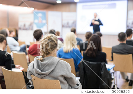 Business speaker giving a talk in conference hall. Business speaker giving a talk in conference hall. 50956295