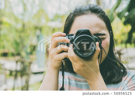 Asian Girl Teen using DSLR Camera Photography 50956525