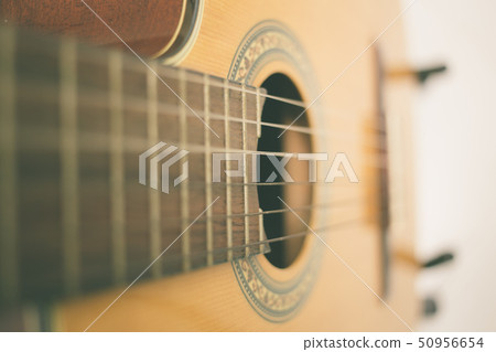 Guitar sound hole vintage color tone. 50956654