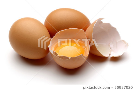 Broken chicken eggs with yolk isolated on white Broken chicken eggs with yolk isolated on white 50957020