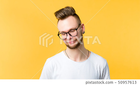 young man doubt skepticism wary look emotion 50957613
