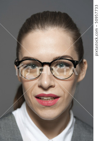 Close-up portrait of charming woman in formal costume Close-up portrait of charming woman in formal costume 50957733
