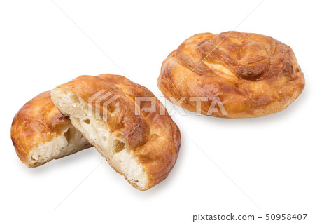 Baking from puff pastry, Vertuta or placinda with cottage cheese and cheese. Baking from puff pastry, Vertuta or placinda with cottage cheese and cheese. 50958407