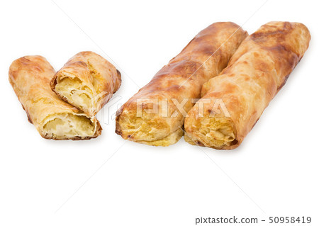 Baking puff pastry with potatoes and mushrooms, one pastry in the cut. Baking puff pastry with potatoes and mushrooms, one pastry in the cut. 50958419