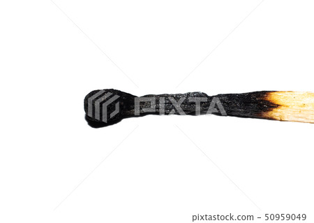 Black head of a burnt match close up, isolated 50959049