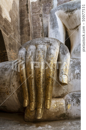 Long Fingers of Giant Buddha at Ayuthaya, Thailand Long Fingers of Giant Buddha at Ayuthaya, Thailand 50977531