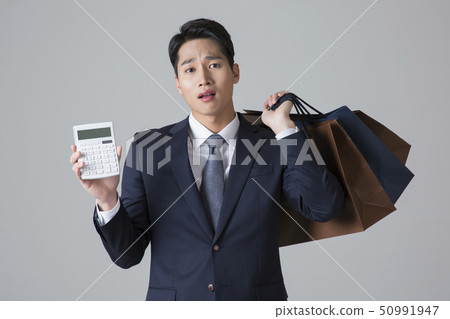 Attractive young man. sale, shopping, fashion, and style concept photo 332 50991947