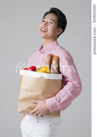 Attractive young man. sale, shopping, fashion, and style concept photo 423 50992000