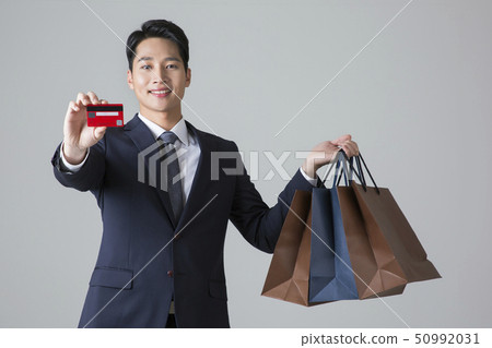 Attractive young man. sale, shopping, fashion, and style concept photo 336 50992031