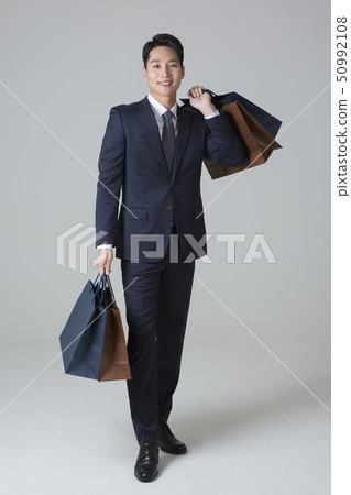 Attractive young man. sale, shopping, fashion, and style concept photo 327 50992108