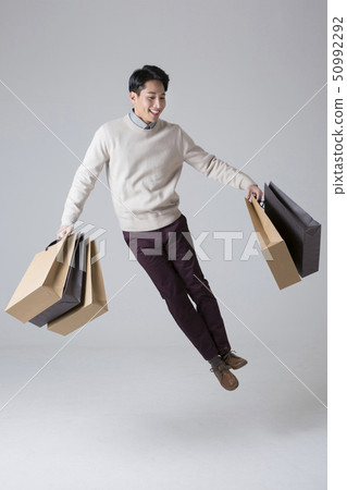 Attractive young man. sale, shopping, fashion, and style concept photo 223 50992292