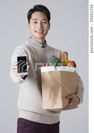 Attractive young man. sale, shopping, fashion, and style concept photo 205 50992356