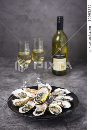 Close up of winter food ingredients Isolated on white background - salsify, oyster, mussel, shrimp and clam 067 Close up of winter food ingredients Isolated on white background - salsify, oyster, mussel, shrimp and clam 067 50995252
