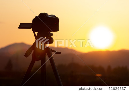 Taking a Sunset with a Digital SLR Camera 51024887