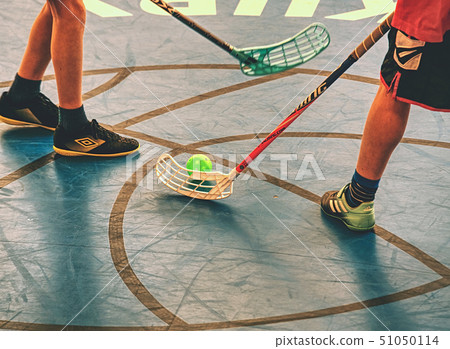 Player in the bully area. Man playing floor hockey Player in the bully area. Man playing floor hockey 51050114