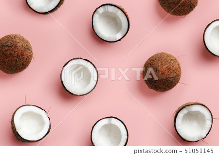 Pattern with ripe coconuts on pink background. Top View. Copy Space. Pop art design, creative summer Pattern with ripe coconuts on pink background. Top View. Copy Space. Pop art design, creative summer 51051145
