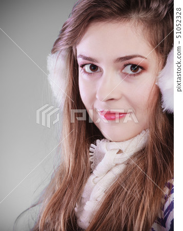 Young woman in wintertime. Young woman in wintertime. 51052328