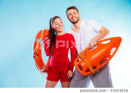 lifeguards on duty with equipment 51053658