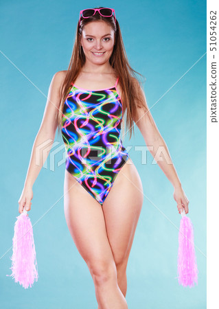 Young woman girl in swimsuit with pom poms. Young woman girl in swimsuit with pom poms. 51054262