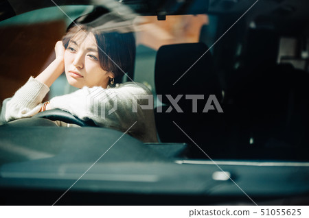 Woman car drive think 51055625